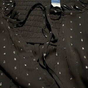 Black sparking blouse with all of the buttons